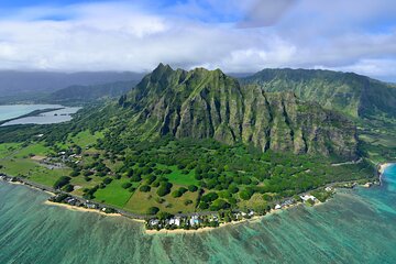 Doors-Off Valleys and Waterfall Explorer from Turtle Bay
