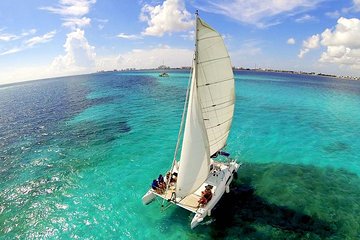Snorkeling adventure to discover Isla Mujeres reef, includes buffet and open bar