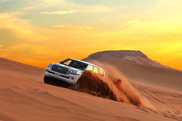 4 hours Dubai: Red Dune Bashing Safari, Sand Surfing & Camel Ride