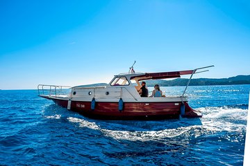 Private boat tour- explore the islands, find hidden caves and try snorkelling