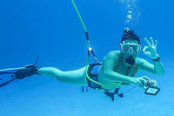 Punta Cana Combo: Diving, Parasailing, Snorkeling & Party Boat (Half Day)