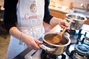 Local market visit and private cooking class at a local's home in Bologna