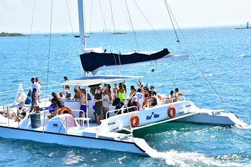 Incredible Catamaran to Isla Mujeres, snorkel + beach club