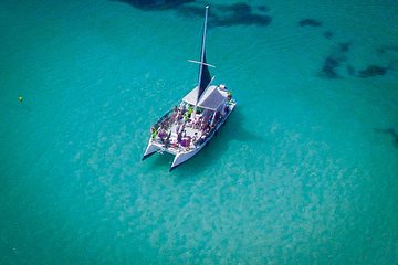 Catamaran Sailing Cruise with Snorkeling and Parasailing