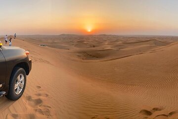 Morning Red Dunes Desert safari with camel ride, Sand Boarding