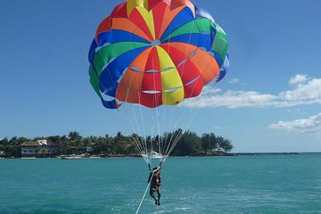 Parasailing & Beach Hopping In The North With Hotel Pickup & Dropoff