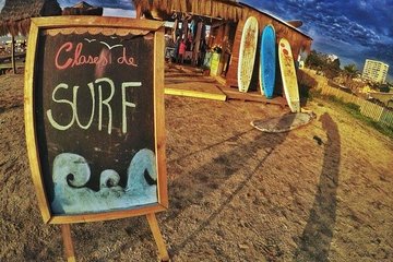 Surfing, Ester Island statue & Sandboarding+ Chilean drinks & food
