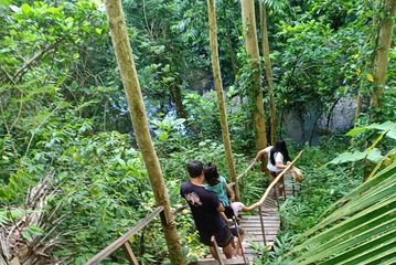 Ubud village trekking ending at hidden waterfall with lunch box