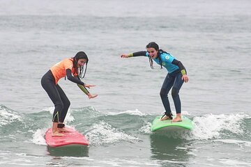 Surfing Class with transportation in Porto